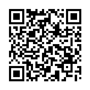 一个个被整齐排放好的棺材缓缓被推开二维码生成