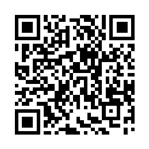 一个升降型的机械装置托出一个手掌大小二维码生成