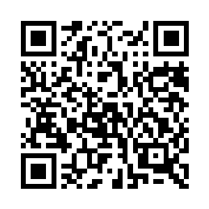 一个小小的瓶子躺在了密封的玻璃里面二维码生成