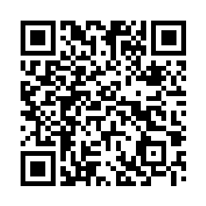 一个巨大的骷髅头从坟墓的裂缝之内窜出二维码生成