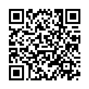 一件淡米色的羊绒大衣扔在车后座上二维码生成
