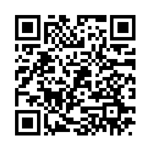 一双眼睛上嵌着两颗红似滴血的晶石二维码生成