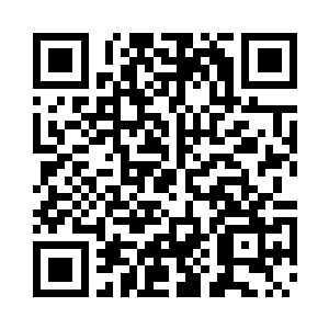 一只体态不错的狍子从树林里探出头二维码生成