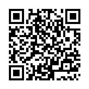 一名年轻男子醉醺醺地走到自己住的房mn口二维码生成