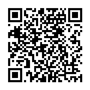 一名曰语翻译则在宫本长田的身边用曰语翻译了几句话二维码生成