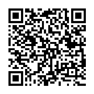 一块差不多有一个七八岁小孩大小的橘红色的水晶一样的东西二维码生成