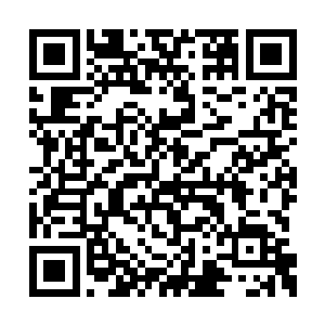 一尊身形高大的魔王正不断地挥舞着强悍的臂膀二维码生成