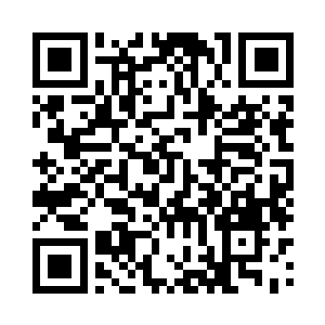 一座座石头做的小屋屋顶已经是炊烟缈缈二维码生成