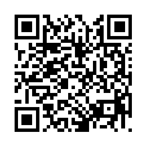 一抹褐灰色的拳头大小的石块出现在眼中二维码生成