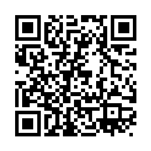 一旁的司空展一边回答着马允辉的询问二维码生成