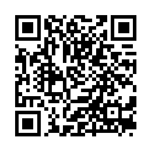 一条浑身披着黑色鳞甲的五爪真龙盘绕二维码生成