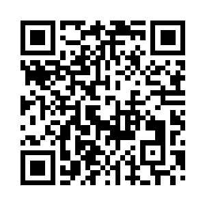 一条静静流淌的小溪旁竖立着一个大木棚子二维码生成