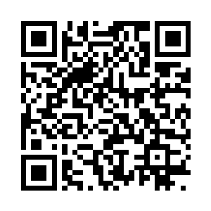 一架残破不堪的青铜机关武甲纷纷从壕沟里二维码生成
