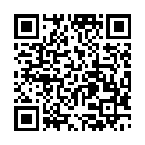 一行三人最终停在了一个圆拱形的建筑前二维码生成