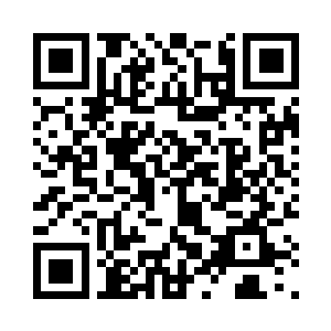 一辆盖着军绿色篷布的大卡车缓缓驶进了厂区二维码生成