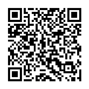 一辆黑色别克轿车正飞速地朝着林烽家方向开了过去二维码生成