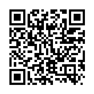 一边伸手从书桌上拿起了一本名为二维码生成