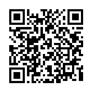 一边嘴角带着一丝笑意的看着前面的一份报纸二维码生成