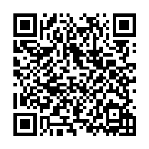 一边将当时赵禁送给自己的玄金衣从乾坤戒指取出二维码生成