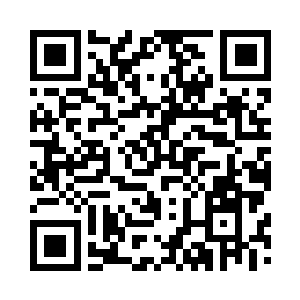 丁二狗将车停在酒店门前的水泥地上二维码生成