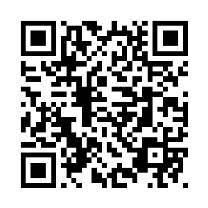 丁羽正坐在一家咖啡馆里面喝咖啡二维码生成