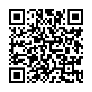 不时可以看到与他有着相同装扮的人走在路上二维码生成