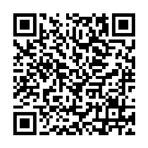 不时有身穿黑色作战服的秘社武装人员冲上废墟街道二维码生成