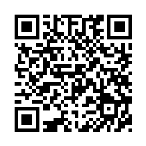 不甘心地在报亭摊位上四处翻找了起来二维码生成