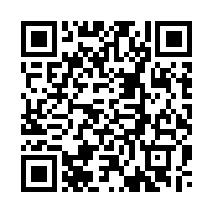 两人坐在办公室吞云吐雾地议论着二维码生成