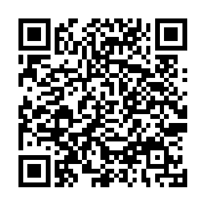 两头坐着湖州市委秘书长陶成军和湖州市委组织部长顾青山二维码生成