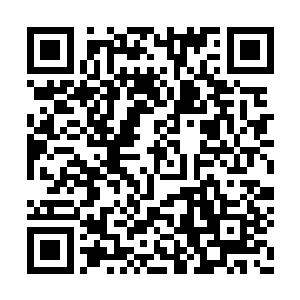 乍一看就似用精钢铁母打造的三个巨大的骷髅人二维码生成