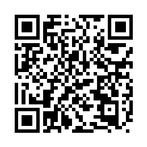 了解海边建筑的其他建筑师提醒他防范海浪二维码生成