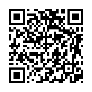 二层上面甚至有几个人手里面都抓着枪支二维码生成