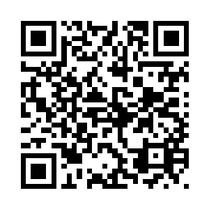 人们还在清理着自己受灾后的家园二维码生成