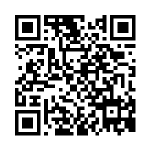 人懒散地躺在价值过万的棕红色转椅上二维码生成