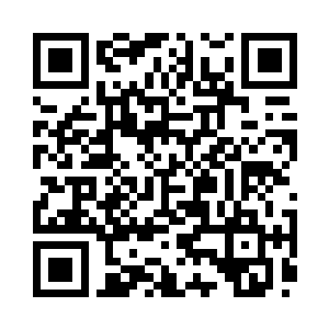 仅仅凭借左臂上镶嵌的一连串淡黄色晶体二维码生成