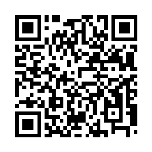 仍是在这座古志城正门的铁索桥前二维码生成