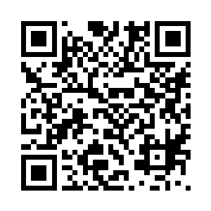 从书架上抽出一本书来送给冷小野二维码生成