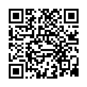 从蜥车的窗子里就可以看到虎陀镇的景象二维码生成