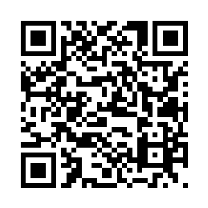 他们在看上去面无边际的城市中穿行二维码生成