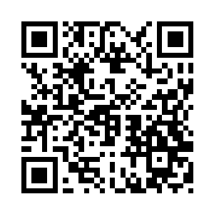 他便将一个黑色的乾坤戒指放置在桌上二维码生成