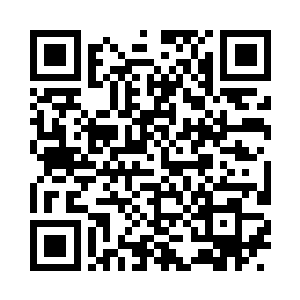他握着方向盘的手背上的淤青还没有散二维码生成