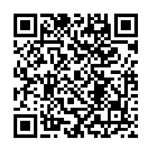 他整个人就像是化为了一块西伯利亚冰雪之中的顽石二维码生成