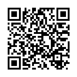 他满是皱纹的脸上现出了无法掩饰的笑容二维码生成