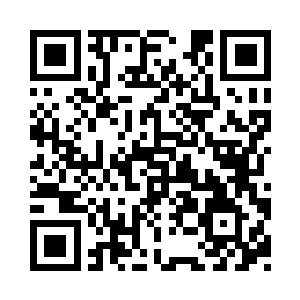 他用石块刻出了一个是字却又不似字的二维码生成