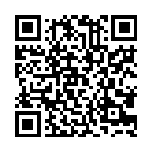 他的目光忽然看到床头柜上摆放了一台电话机二维码生成