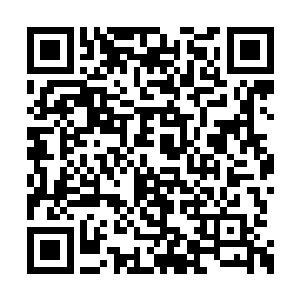 他肯定能够认得出这张照片里面的年轻女人是谁二维码生成