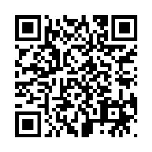 他虽然看似懒洋洋的坐在驾驶位上抽烟二维码生成