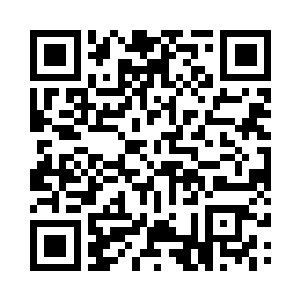 他身边的一个穿着淡蓝色长袍满脸胡须二维码生成