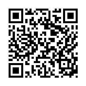 以及一个笔记本电脑和机器猫的小公仔二维码生成